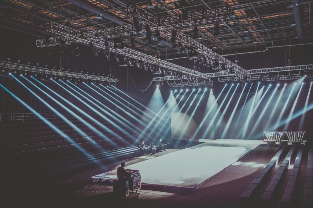 Professional event production London featuring custom stage design and LED screens.