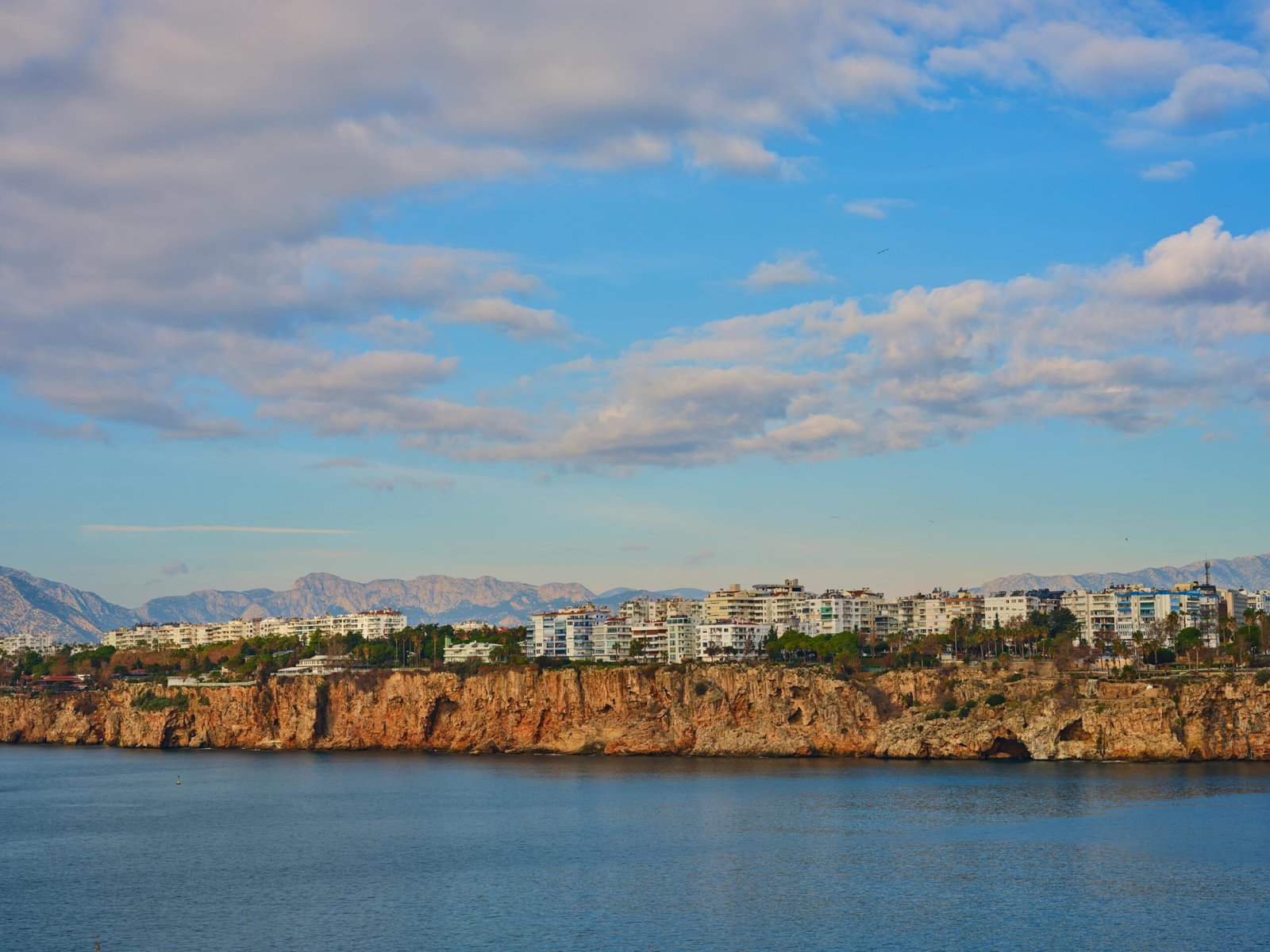 Sustainable Panoramic view of Antalya's stunning cliffs  2026 featuring green architecture and the residential architecture by the sea for corporate events.